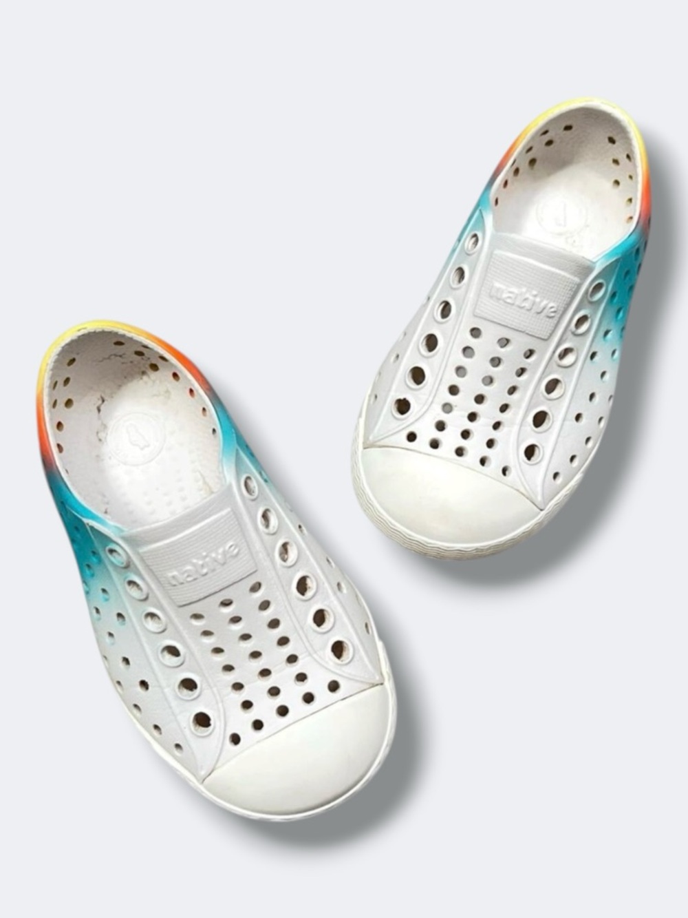 Native Kids White Slip-On Sneakers with Teal and Orange Gradient